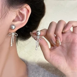 Silver Needle Niche Bow Earrings