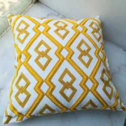 Embroidered bedside pillow