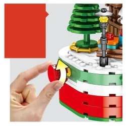 Revolving Christmas house assembled building blocks