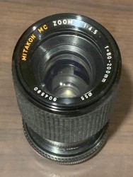 Canon T50 SLR Camera with additional lenses and OEM manuals