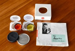 Leica IIIg IB, E39 UV and Y1 filters for 50mm Summicron, etc. Excellent.